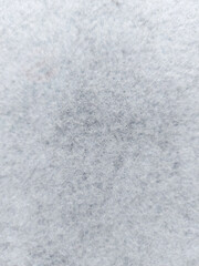 white gray felt fabric texture. winter background. wallpaper