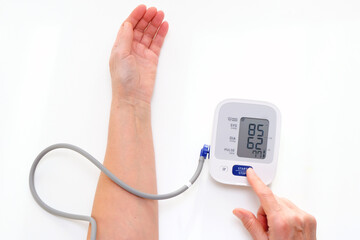 Man measures blood pressure