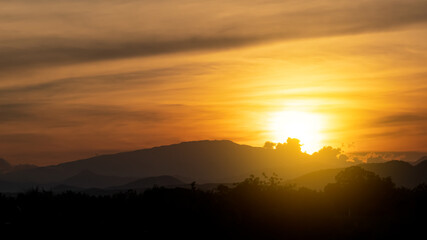 Fototapeta na wymiar Evening sunset with a beautiful golden sky
