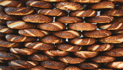 Stacked Turkish circular sesame breads (simit)