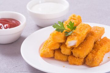 Fried fish sticks ( fingers ) or chicken nugget