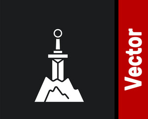 White Sword in the stone icon isolated on black background. Excalibur the sword in the stone from the Arthurian legends. Vector.