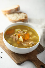 Traditional homemade salmon soup with vegetables
