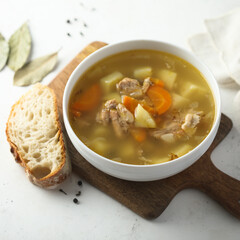 Traditional homemade salmon soup with vegetables