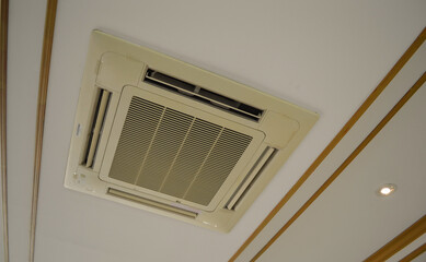 Old commercial built-in air conditioner  in classic meeting room.