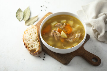 Traditional homemade salmon soup with vegetables