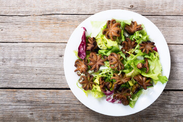 Salad with Baby octopus fried