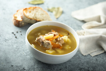 Traditional homemade salmon soup with vegetables
