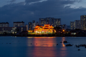 View of a temple from the Jetties in Georgetown, Penang, Malaysia. These jetties are UNESCO world heritage and chinese communities still live in them.