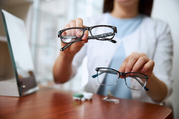 Medical worker providing two variants of glasses