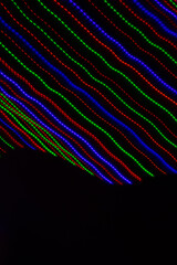 colored lines on a black background.textura