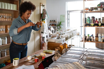 Small business owner shooting organic cosmetic