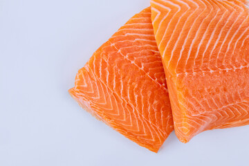 Two fresh raw salmon fillet with on isolated white background