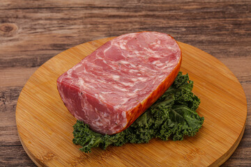 Beef ham piece over board