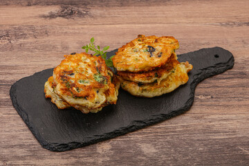 Zucchini pancakes with herbs and spices
