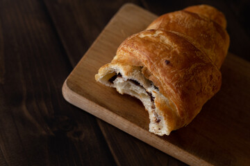 Croissant with chocolate close up