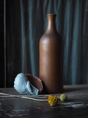 still life with a bottle and a shell