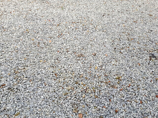 Natural stone pebble material texture background. stone background, dark gravel pebbles stone