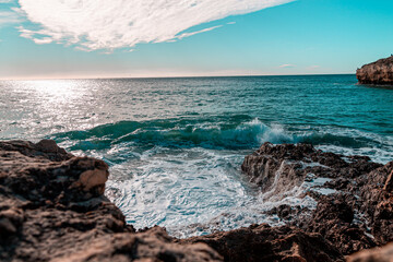 Sunrise on the sea rocks