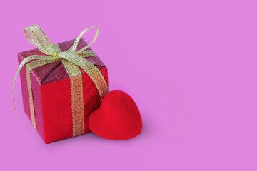 gift box and hearts on pink background, valentine's day