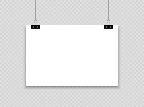 Blank poster hanging on clips. A4 paper page In landscape formats. Realistic white paper sheet. Mockup poster for design.