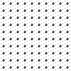 Square seamless background pattern from black mittens symbols are different sizes and opacity. The pattern is evenly filled. Vector illustration on white background