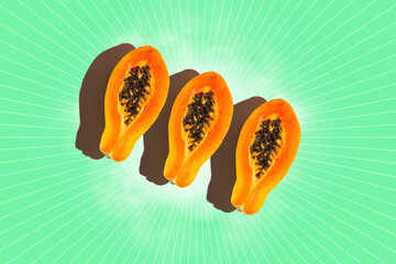 Three slices of papaya  on green background. Top view.