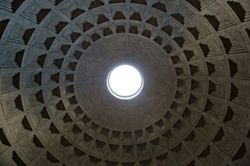 The cupola of the Pantheon from inside in Rome. Sunbeam through the ceiling hole in Pantheon, Rome, Italy