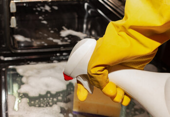 hand in glove, image of kitchen cleaning