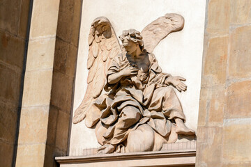 Catholic church of St. Anne. Bas-reliefs of angels above the side entrances. Krakow. Poland