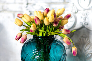 Colorful tulips in a beautiful glass vase
