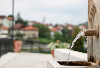 very crystal clear drinking water at the city fountain