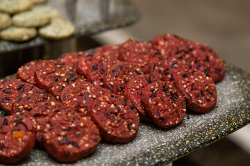 Buffet table with various cookies and biscuits, tarts and cakes