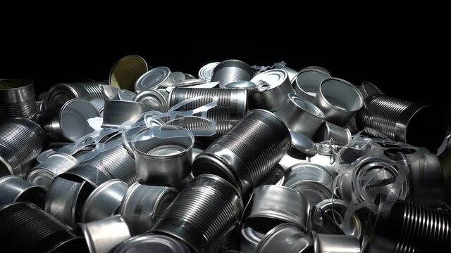 Recycle empty cans and tin. Aluminum soda cans and food jars. Sorted metal trash and garbage ready for recycling. Steel rubbish. Concept of environmental catastrophic apocalypse garbage pollution.