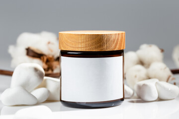 Glass and wooden jar with white label mock up