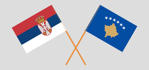Crossed flags of Serbia and Kosovo