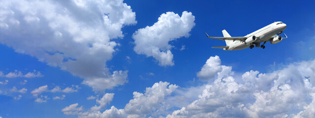 Naklejka na ściany i meble Zoom photo of passenger airplane taking off in deep blue sky and beautiful clouds