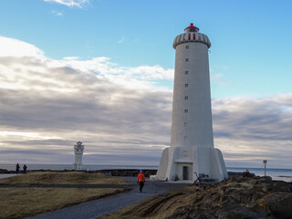 Fototapeta na wymiar Lighthouse in Iceland, winter road trip, great landscape.