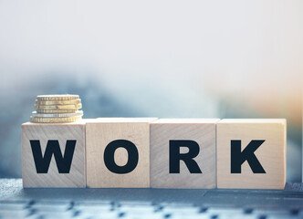 Wok word on wooden cubes, keyboard and coins. Job Search concept