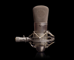 Microphone studio sound equipment on black background