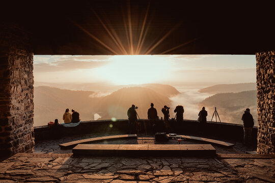Cloef viewpoint with photographers on the Saarschleife near Mettlach, Germany.