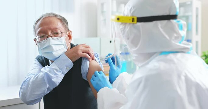 nurse making COVID19 vaccination