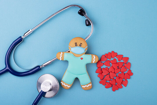 Phonendoscope with gingerbread medic and red hearts