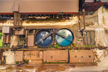 Aerial View of Vast Industrial Landscape. Steel Mills and Heavy Industry, Rail Lines, Bridges, Shipping Canal, Harbor, etc.