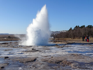 Strokkur geyser in Iceland, during winter road trip.