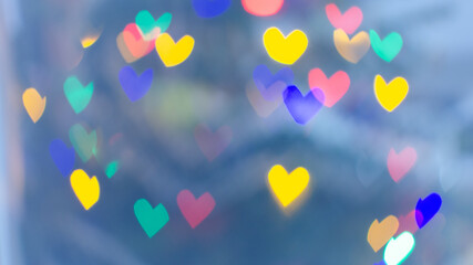 blurred background in the form of multicolored hearts