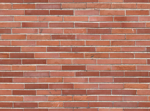 Brick red wall. background of a old brick house. Seamless texture. Perfect tiled on all sides.