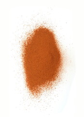 Pile of Red dirt (soil) on white. Heap of Red dry clay isolated on white background. Ochre, also spelled ocher, a natural yellow earth pigment.