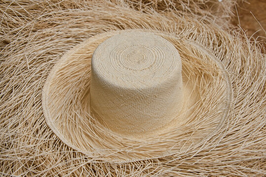 Making and shaping traditional Panama hats (paja toquilla), which actually come from Ecuador.