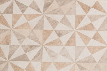 pattern of triangular drawings of different colors. Floor texture with triangular patterns